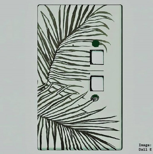 Electric light switch plate with a palm frond decor