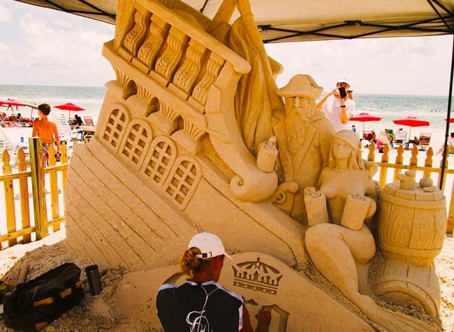 Sculpting with sand on a beach Sculpting with sand on a beach