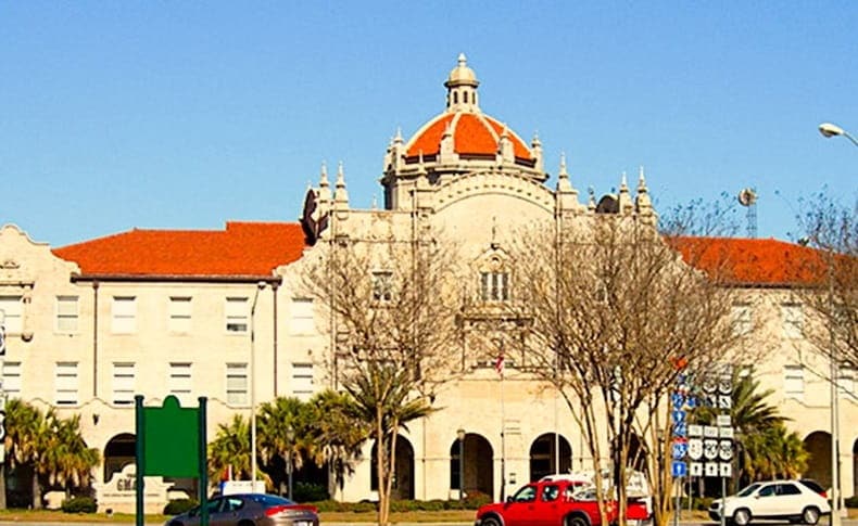 Restored Train Depot with Palms along the front  in Mobile AL