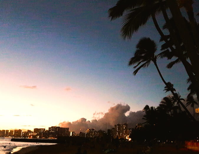 View toward setting sun on Waikiki Beach